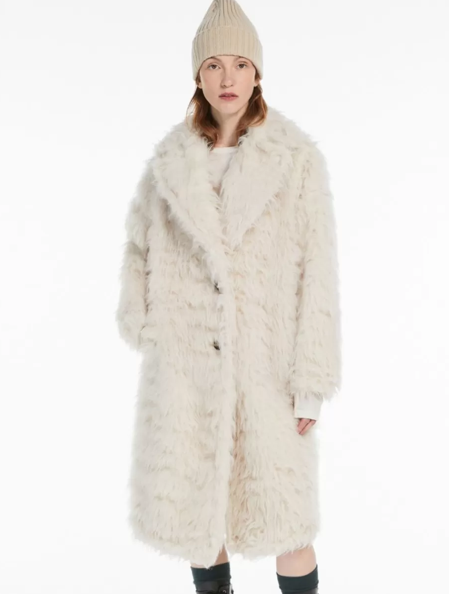 A Whisper of Winter Light: The Intimate Elegance of the Max Mara Alpaca and Wool Wrap Coat in Ecru